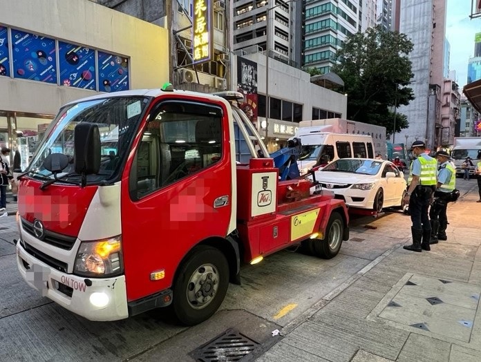 警方旺角交通日，發1093張牛肉乾拖走3車。(警方圖片)