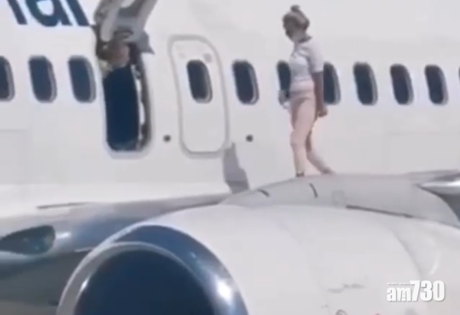 【奇哉怪也】客機飛抵烏克蘭 女子走上機翼「唞涼」(有片)