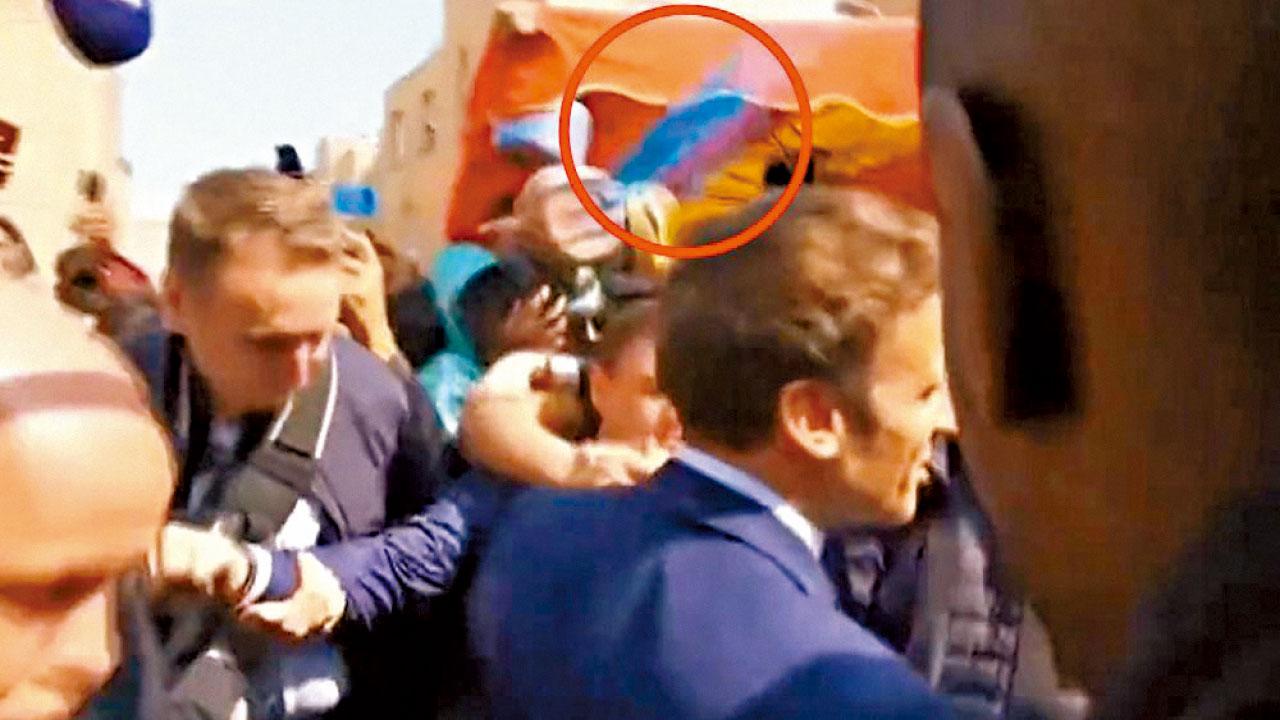 落區謝票|深入窮區爭左翼票源 馬克龍遭擲車厘茄