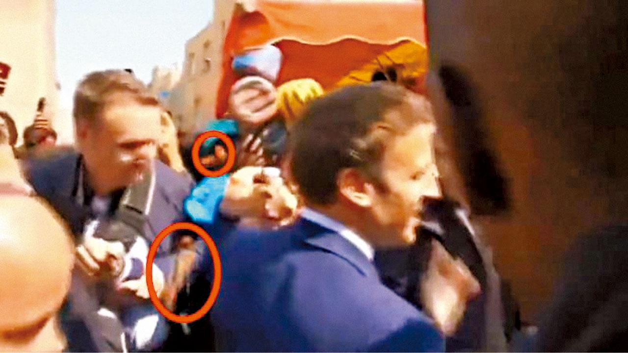 落區謝票|深入窮區爭左翼票源 馬克龍遭擲車厘茄