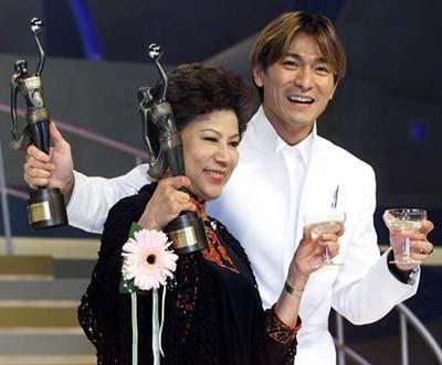 羅蘭與劉德華在第19屆金像獎獲影后、影帝。(網上圖片)