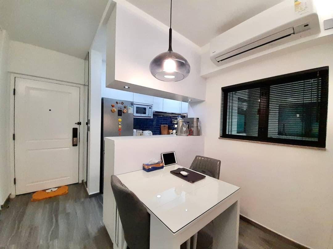 半開放式廚房,增加大廳的空間感。