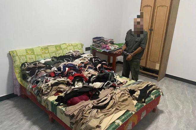 警方清點出近千件女性內衣褲和絲襪,堆滿呂男的大床。(互聯網)