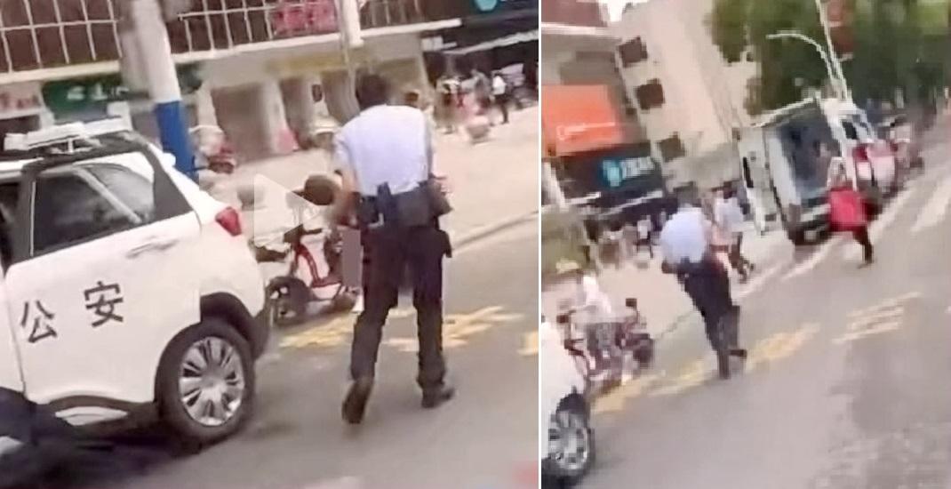 江西幼稚園斬人案,警員將受傷兒童抱上救護車。(互聯網)