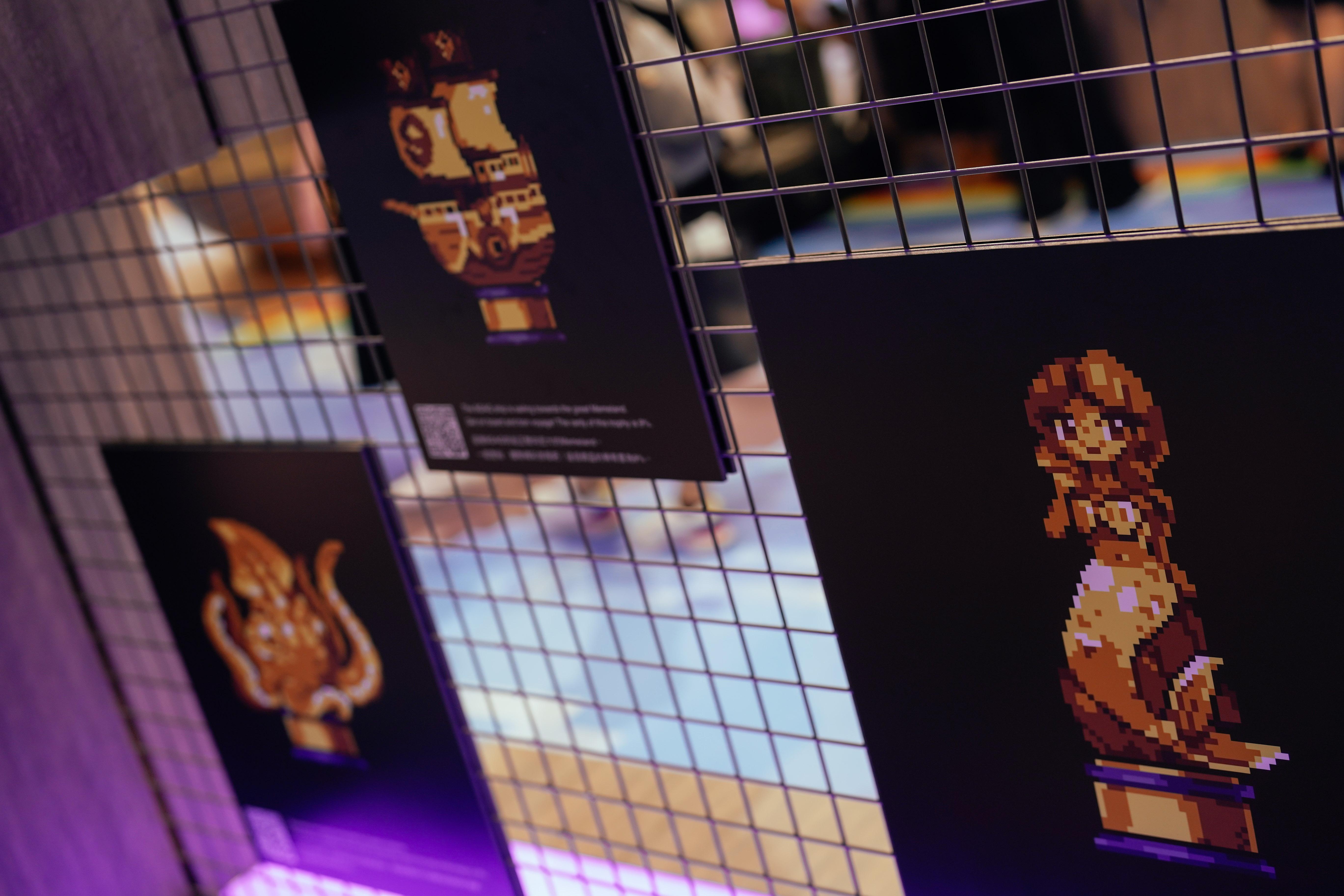 會場設有一幅3米高、8米闊的巨型NFT展示牆,大家可以飽覽30多款「Memeland」系列NFT。