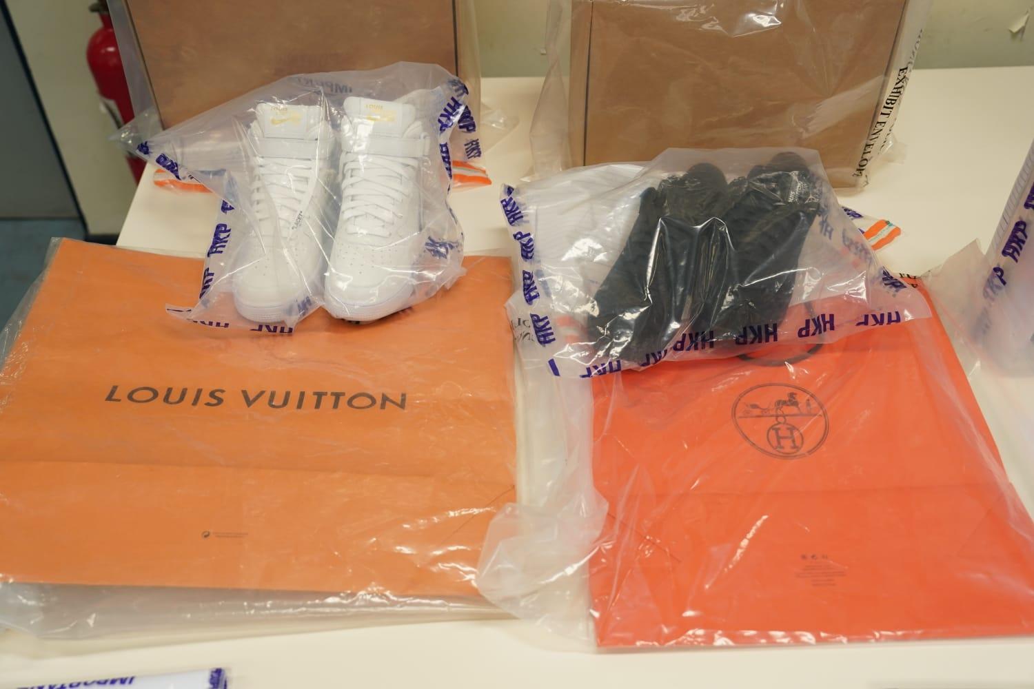 警方拘捕八男一女涉嫌串謀詐騙處理贓物。(陳奕釗攝)