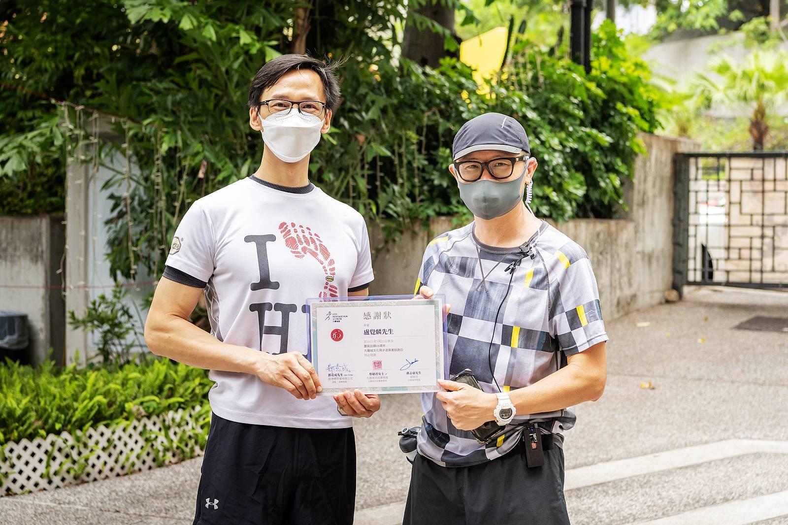 Am730社長盧覺麟也是星級跑手(右),我們一同試跑「九龍城文化飛步遊」路線。