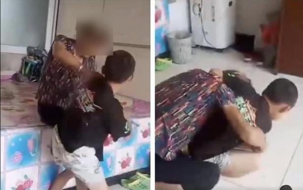 男童打嫲嫲後,勒住嫲嫲頸項將其壓制在地。(互聯網)