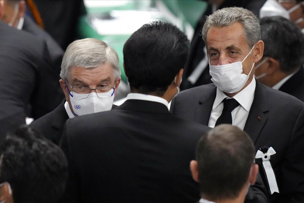 法國前總統薩爾科齊(右)。(美聯社)