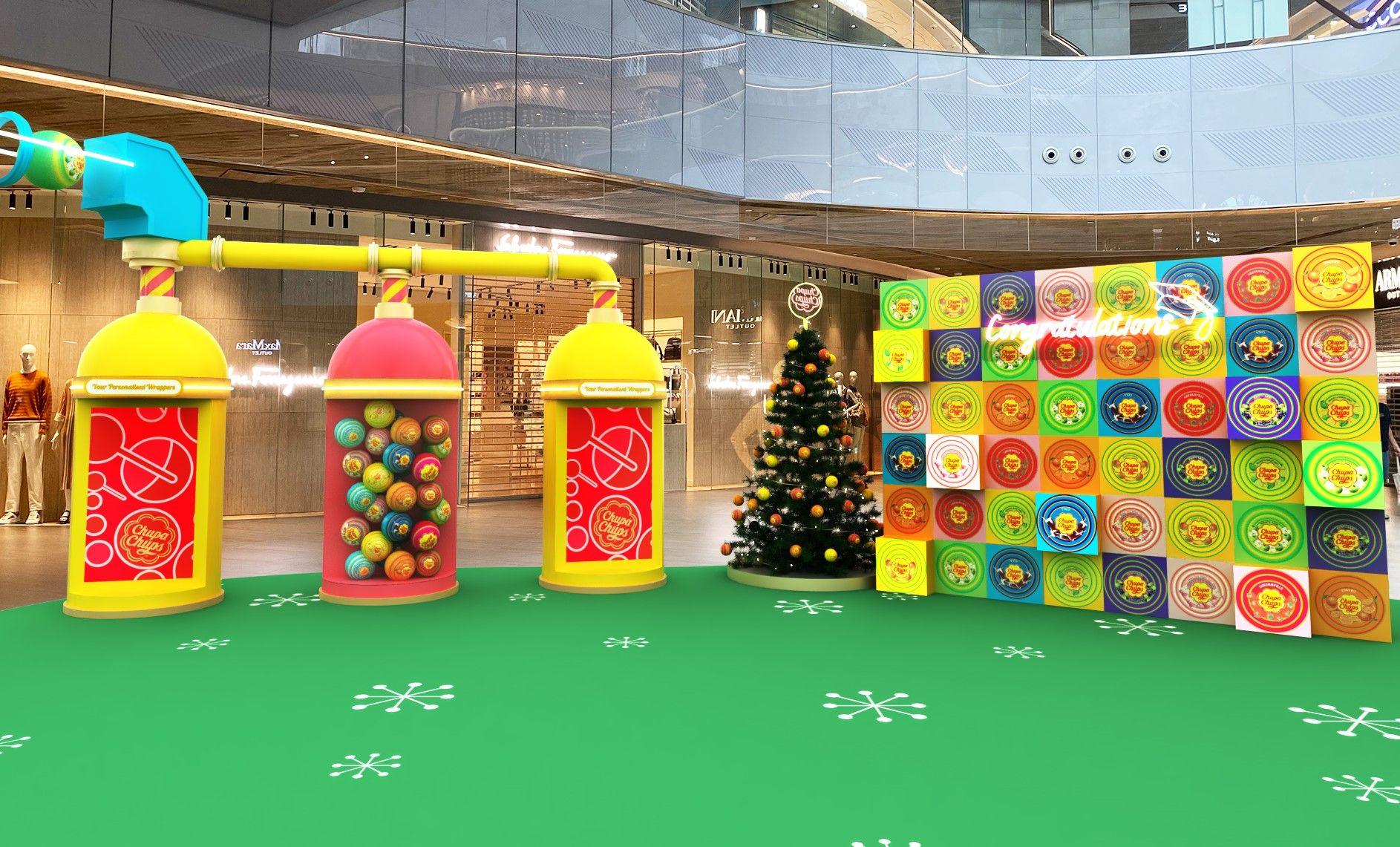 在巨型聖誕糖紙打卡牆和至親好友拍畢業照,慶祝正式成為繽FUN糖果師