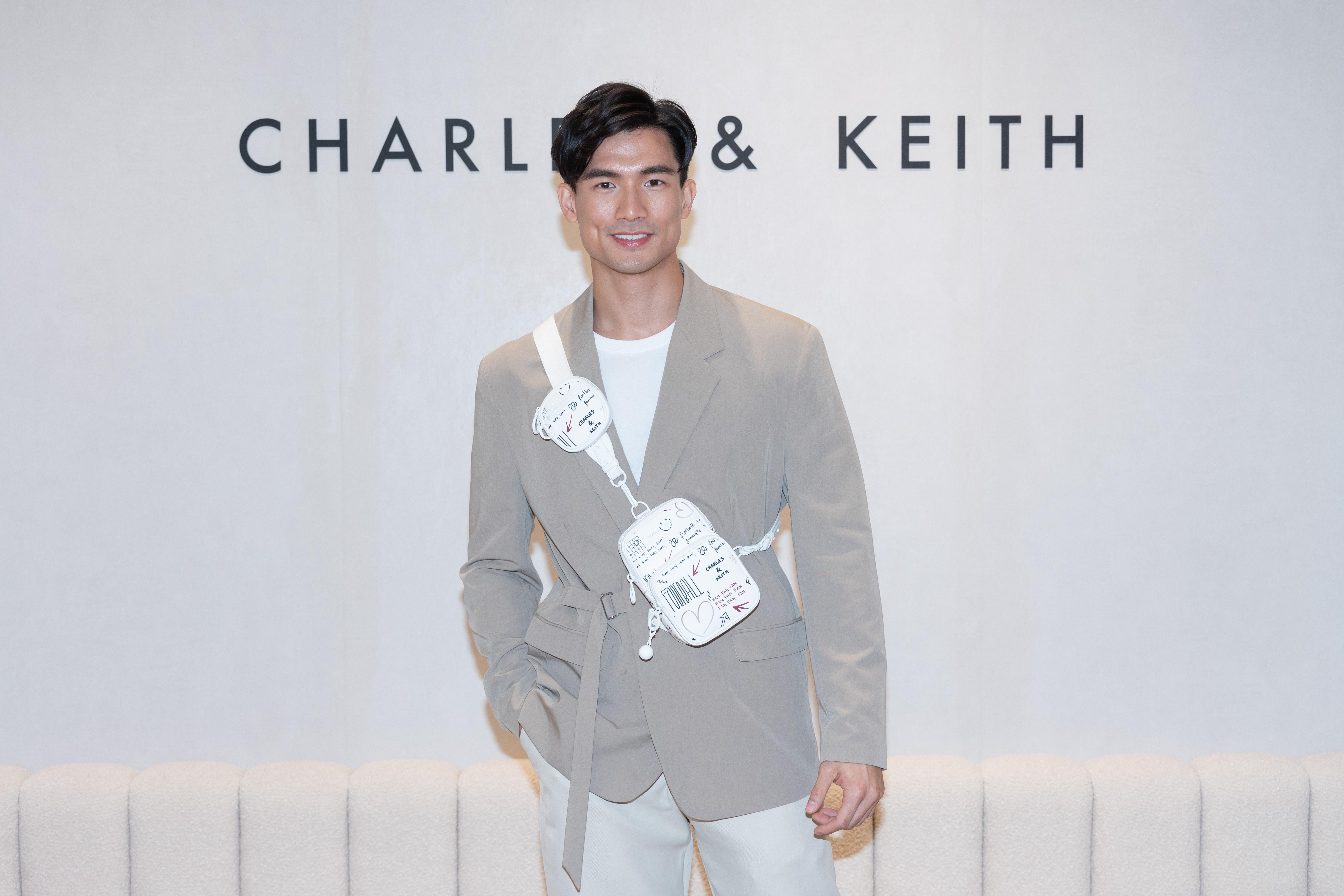 李坤潮在國際先生賽事得到好成績,今次一身西裝打扮配上品牌斜孭袋,盡顯男士魅力。