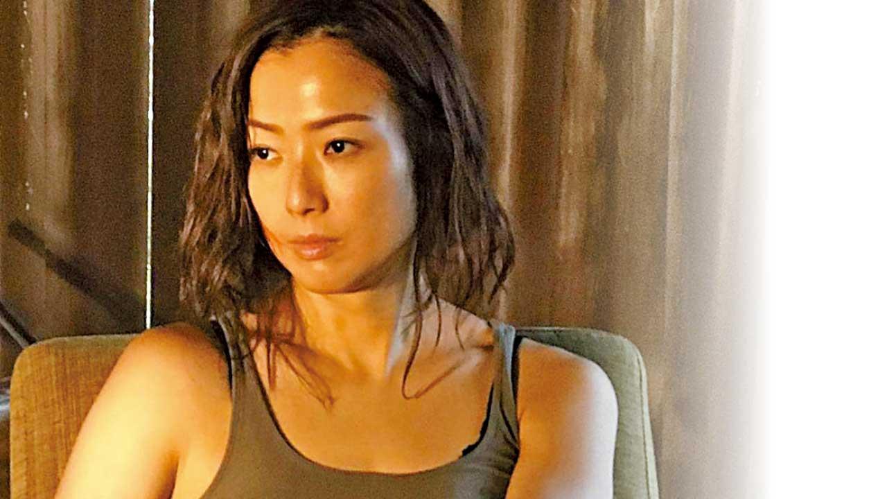 鄭秀文不是湯告魯斯