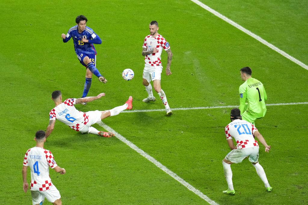 日本一輪組織後,鐮田大地近射高出。(美聯社)