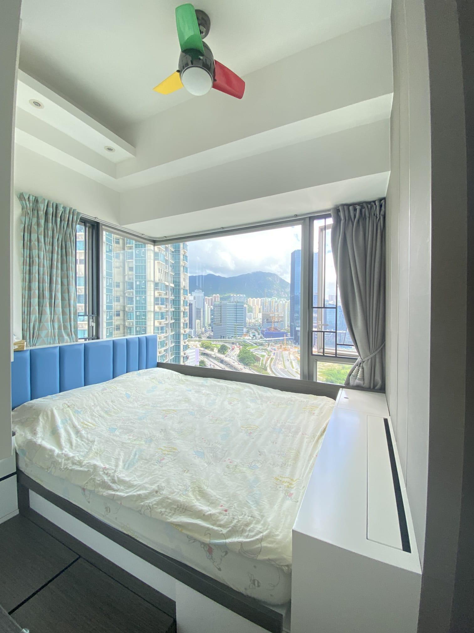 主人房設有90度大玻璃窗,飽覽啟德市景和遠山景。