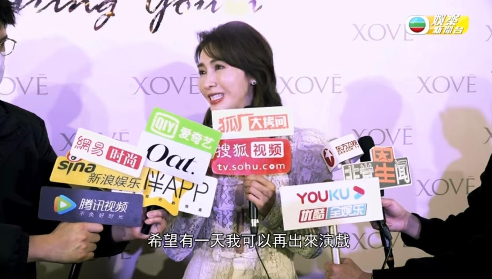 黎現身上海為自己嘅美容品牌宣傳。