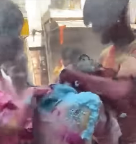 有青年抱着Megumiko的頭襲擊。(影片截圖)