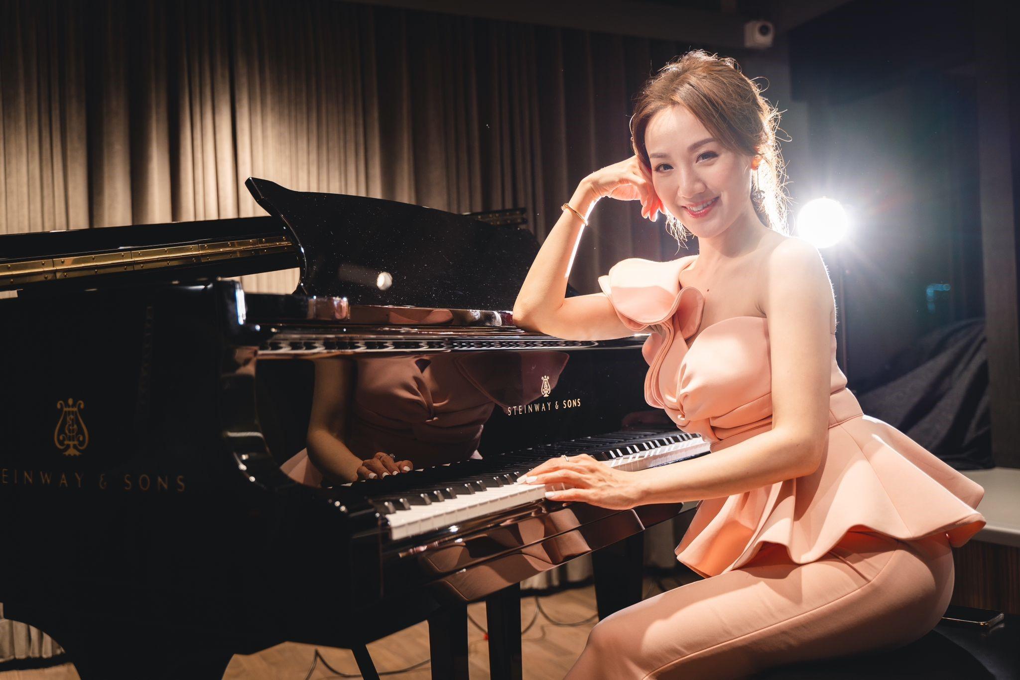 MV幕後功臣正是《中年好聲音》冠軍周吉佩。