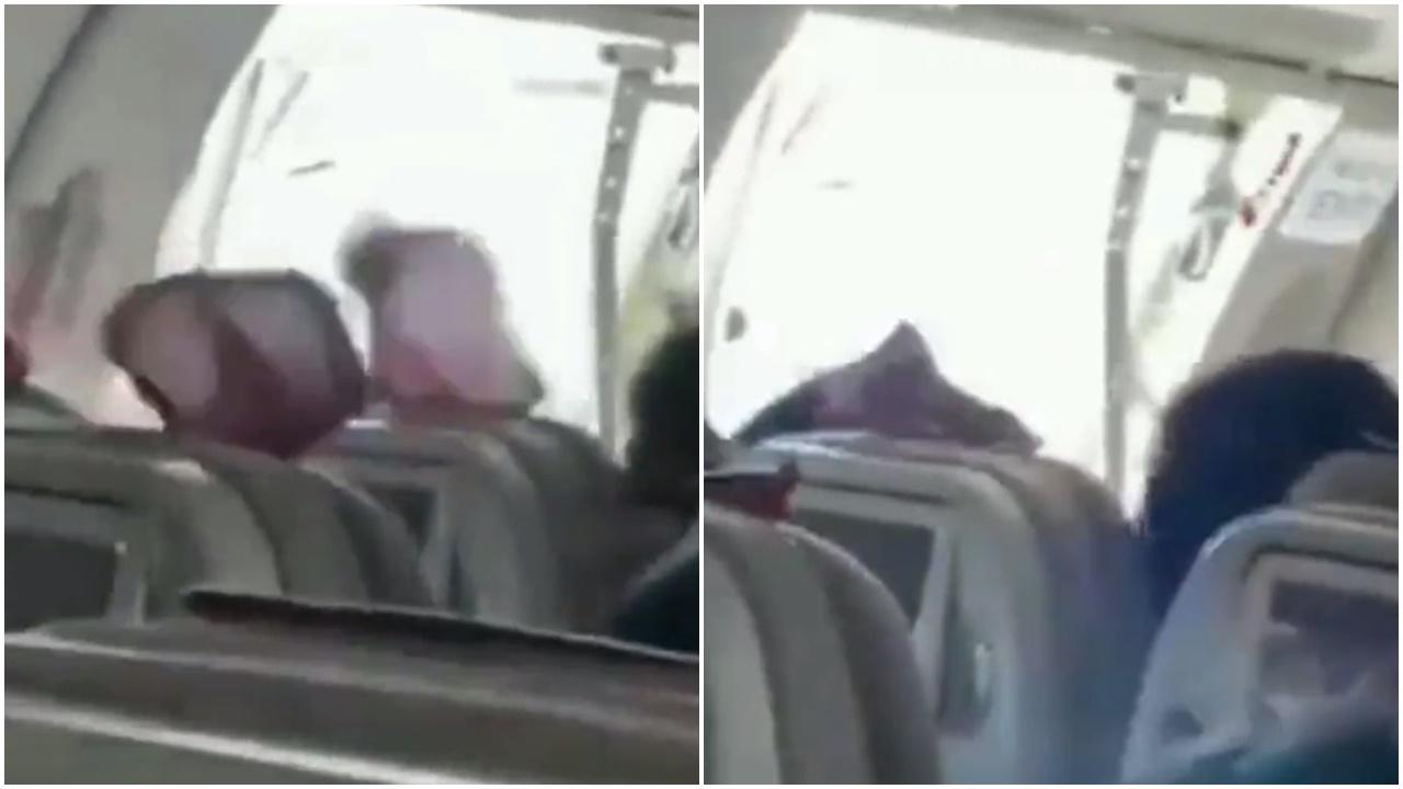 網上流傳事發時機艙內情況影片,顯示飛機艙門被打開後,強烈氣流湧入艙內,乘客頭髮狂飛,畫面相當驚險。(Twitter)