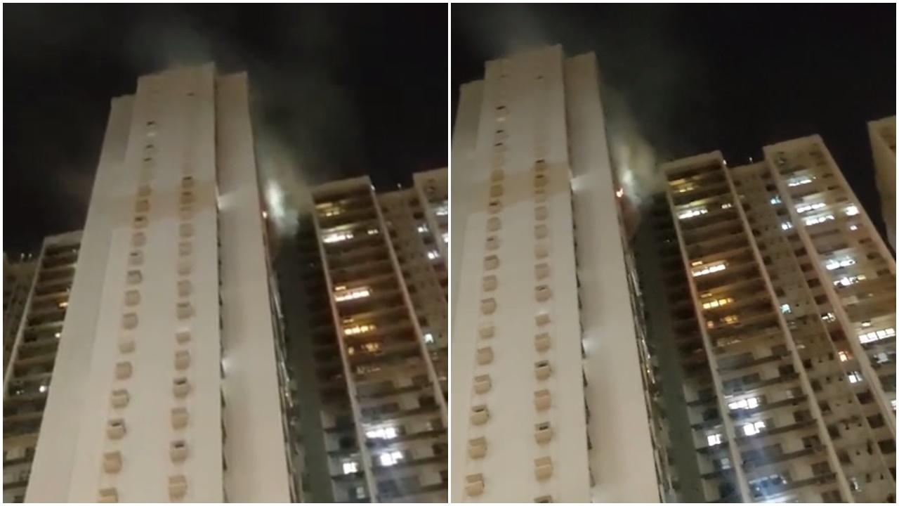 長沙灣海麗邨單位房燈冒火花燒著床褥,逾150人一度疏散。(許浩添@FB)