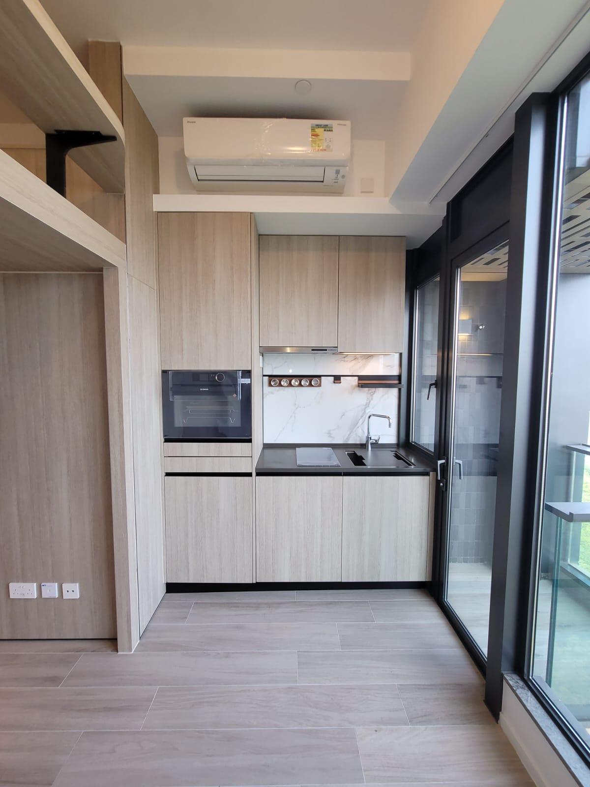 單位廚房為開放式設計,全屬發展商配套,新淨實用。(代理提供)