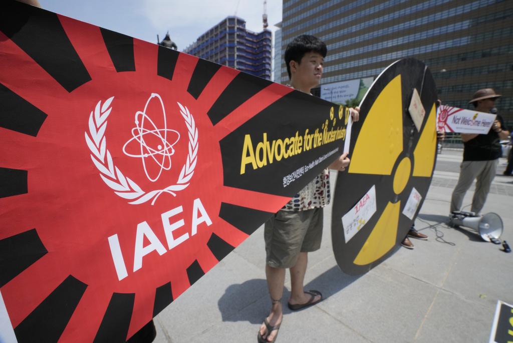 南韓人抗議日本排放核處理水。(美聯社)