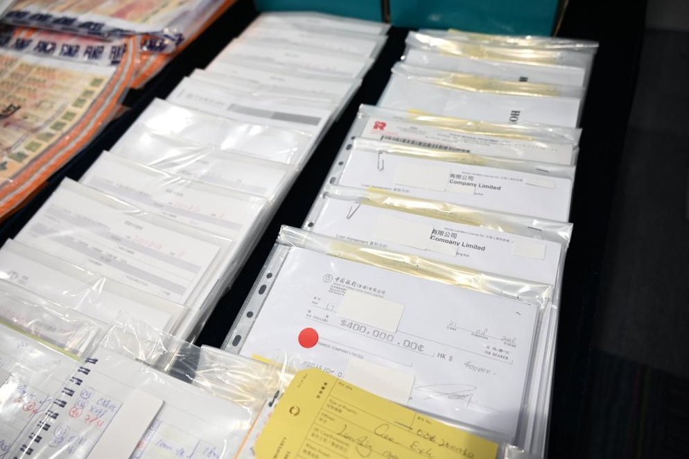 O記破高利貸集團連首腦一家3口拘83人,涉清洗近7千萬黑錢。