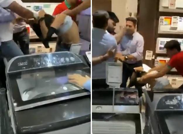 白衣男狂毆店員,扯爛他的上衣,其他人極力制止。(互聯網)