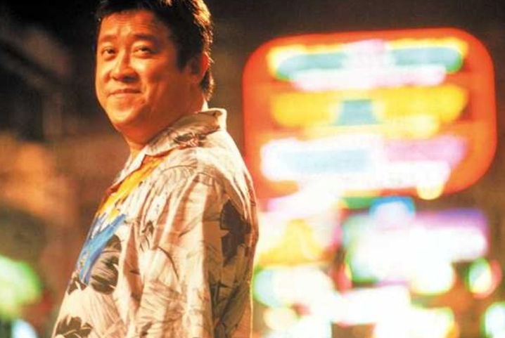 《半支煙》中曾志偉飾演的下山豹,一直想尋找女神阿南(舒淇飾)。(電影截圖)