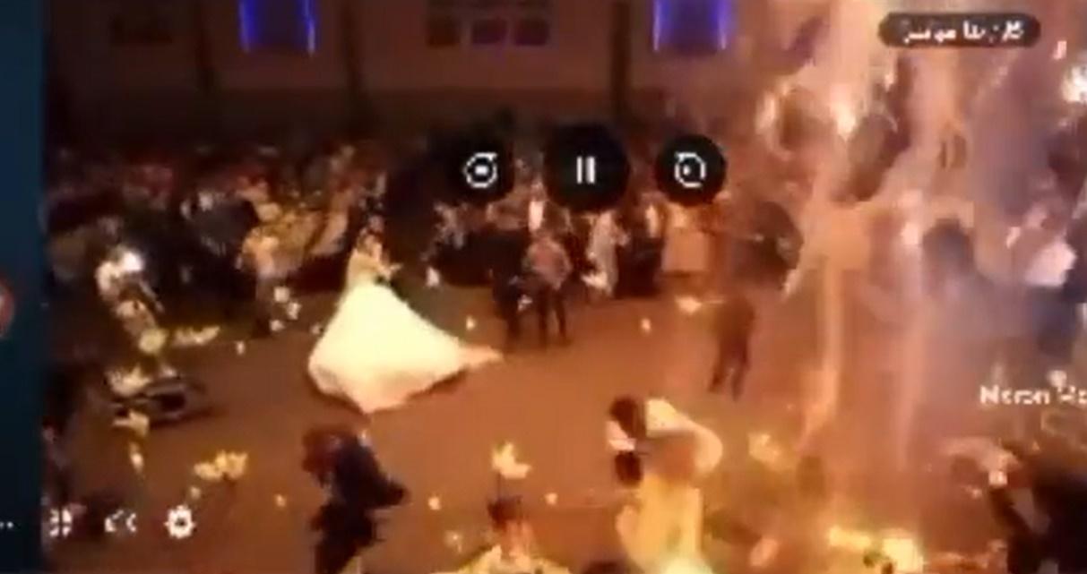 婚禮禮堂頂有起火的物料墮下,猶如火雨。(X)