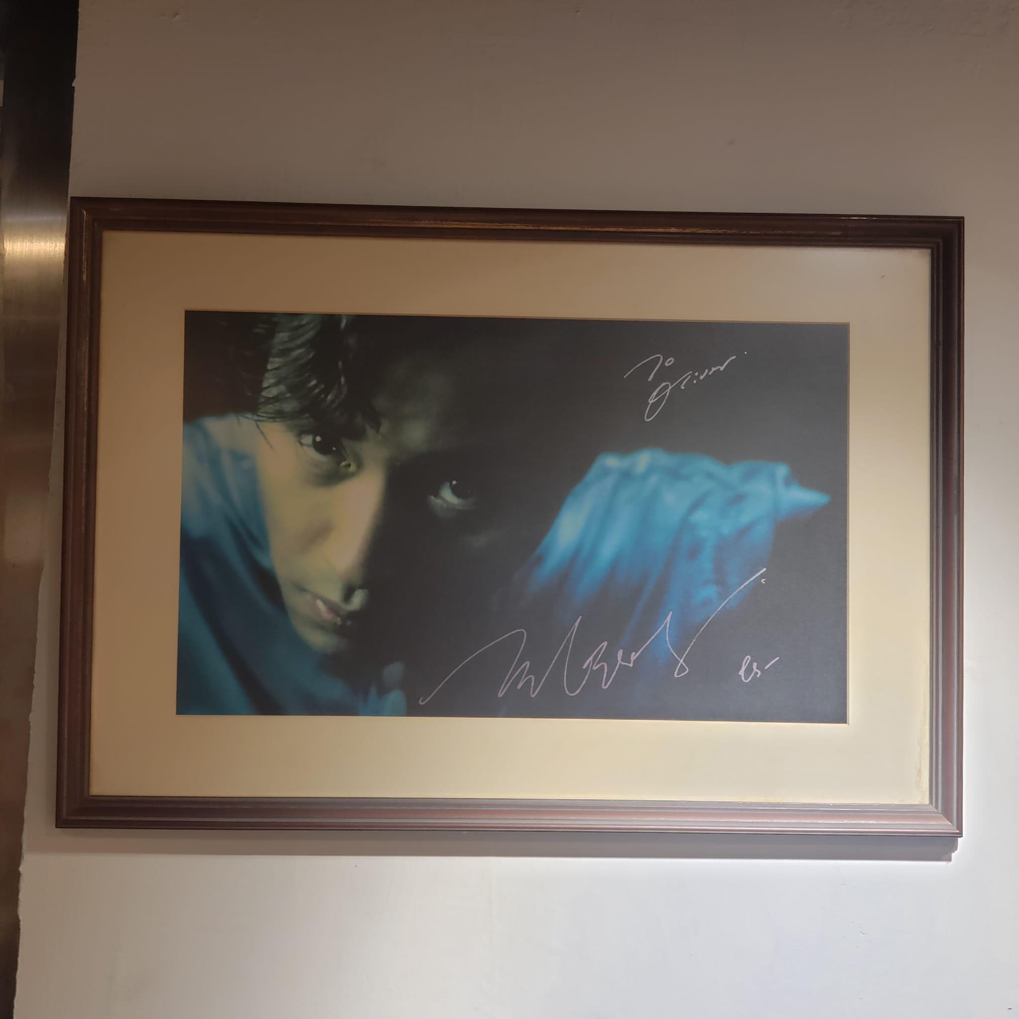 其中有兩張哥哥親筆簽名的《阿飛正傳》照片則由好友Oliver借出展覽。