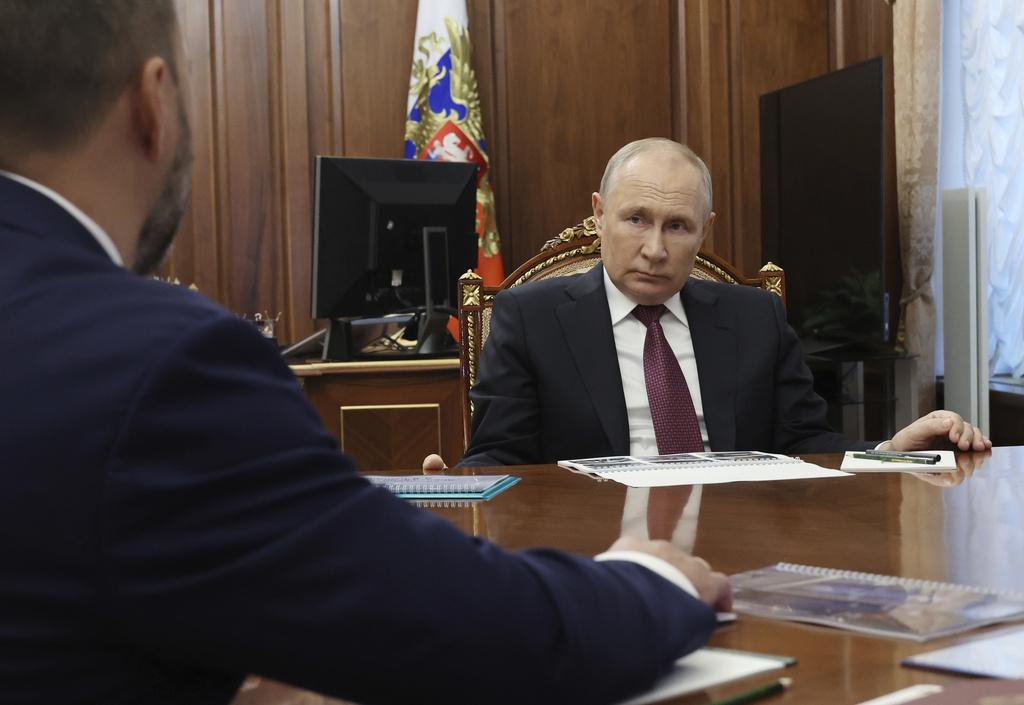 普京替身|普京近期公開露面照片。(美聯社、互聯網)