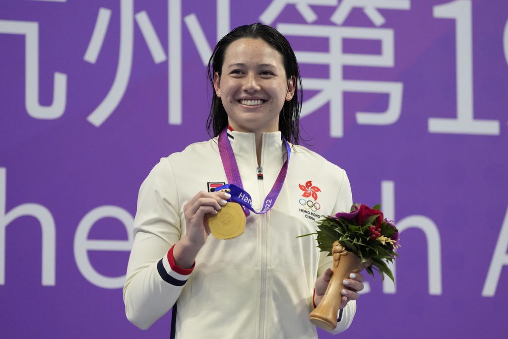 何詩蓓200自刷新亞運紀錄強勢封后,取得個人亞運首金。(美聯社)