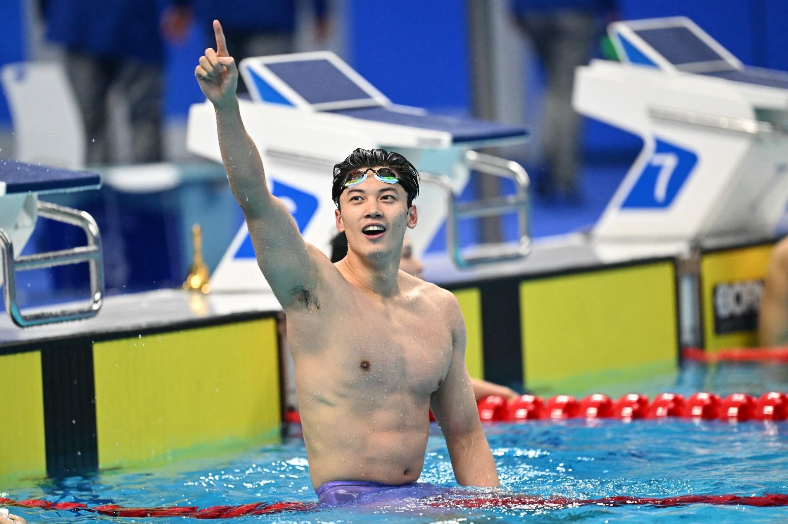 杭州亞運中國游泳「男神」汪順撞樣許光漢。(路透社)