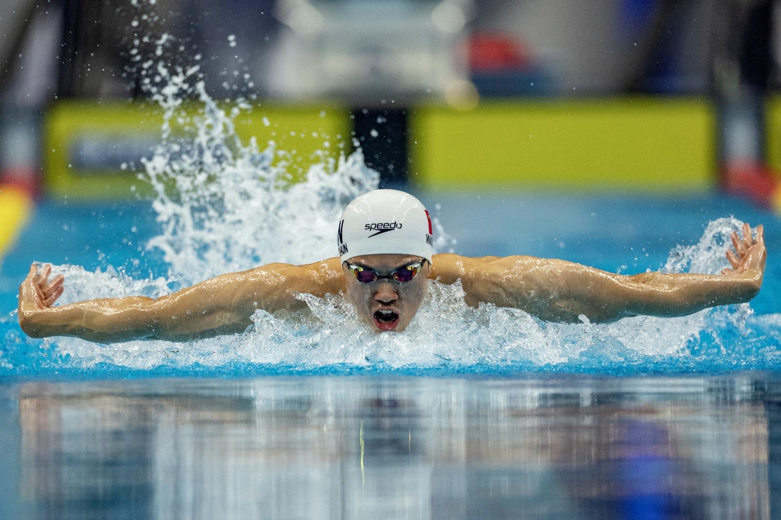 杭州亞運中國游泳「男神」汪順撞樣許光漢。(路透社)