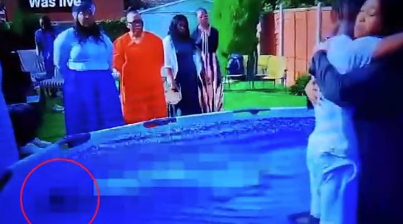 女牧師與男子擁抱,仍沒理會史密斯。(互聯網)