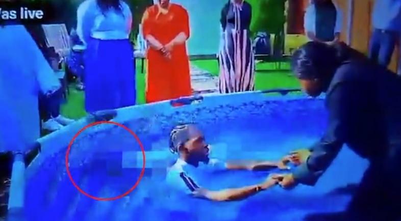 女牧師與男子說話,沒理會史密斯。(互聯網)