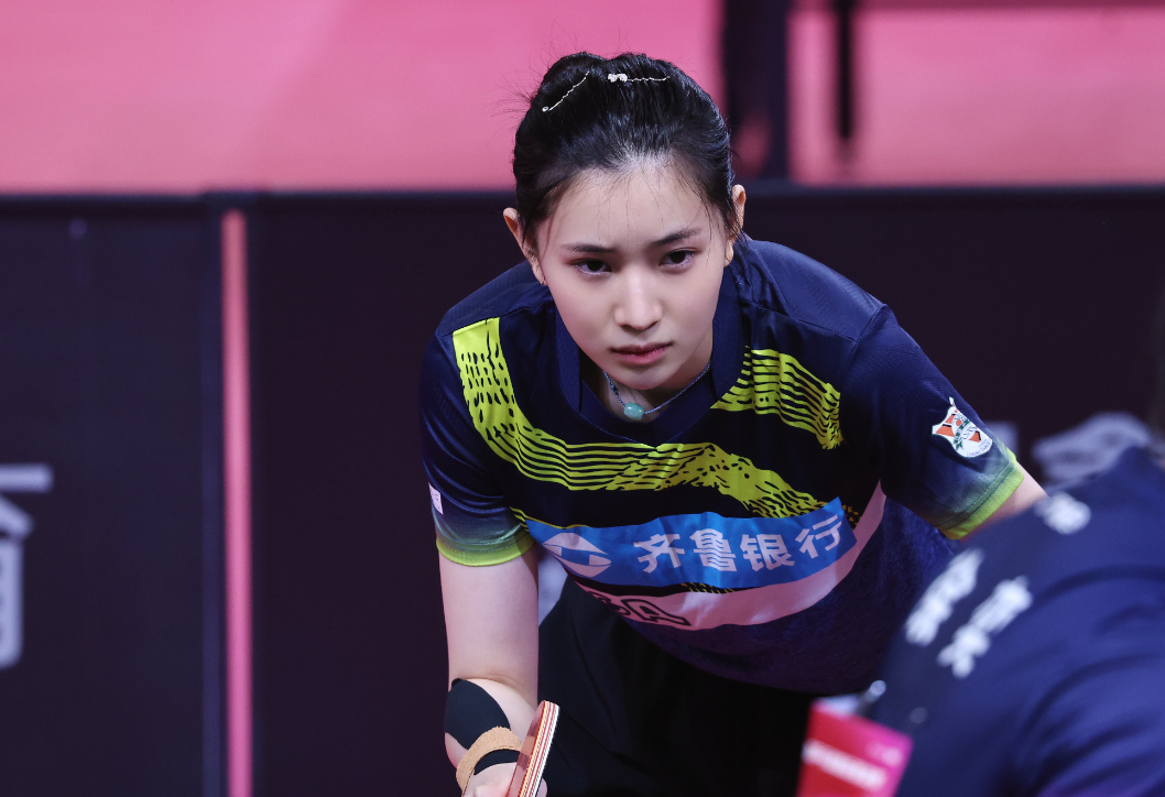 21歲的王添藝爆冷贏波爆紅,網民讚她「國乒第一美女」。 (微博截圖)