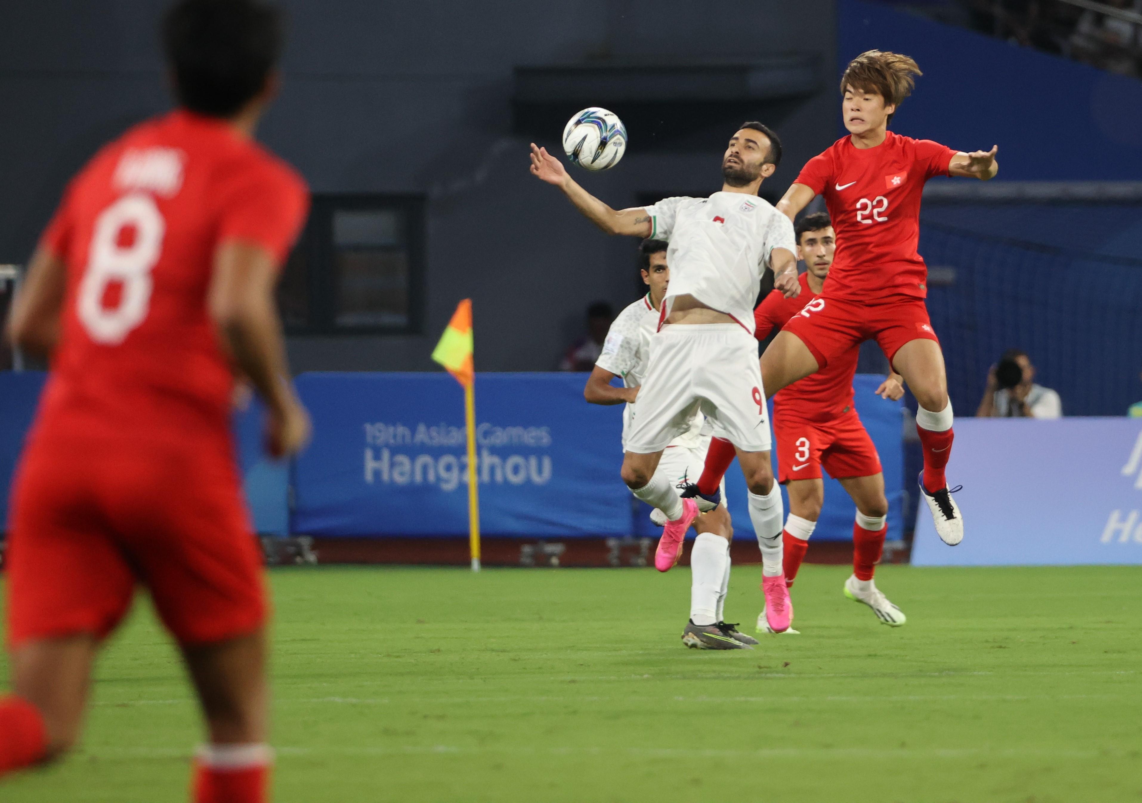 香港足球代表在八強力克伊朗。(中新社)