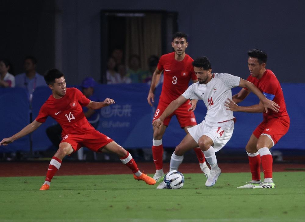 香港足球代表在八強力克伊朗。(中新社)