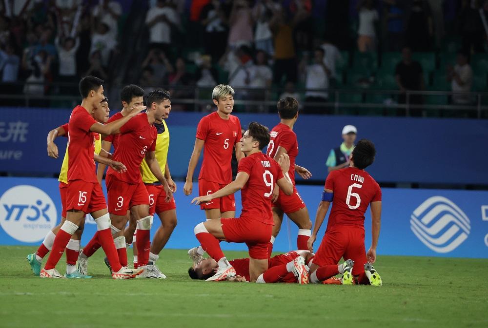 香港足球代表在八強力克伊朗。(中新社)