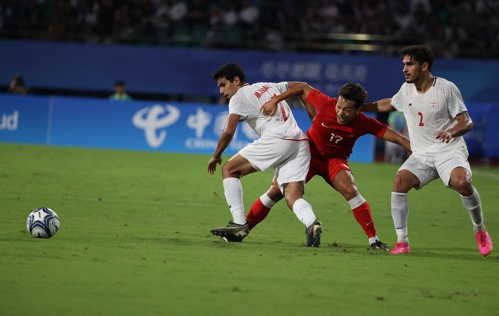 香港足球代表在八強力克伊朗。(中新社)