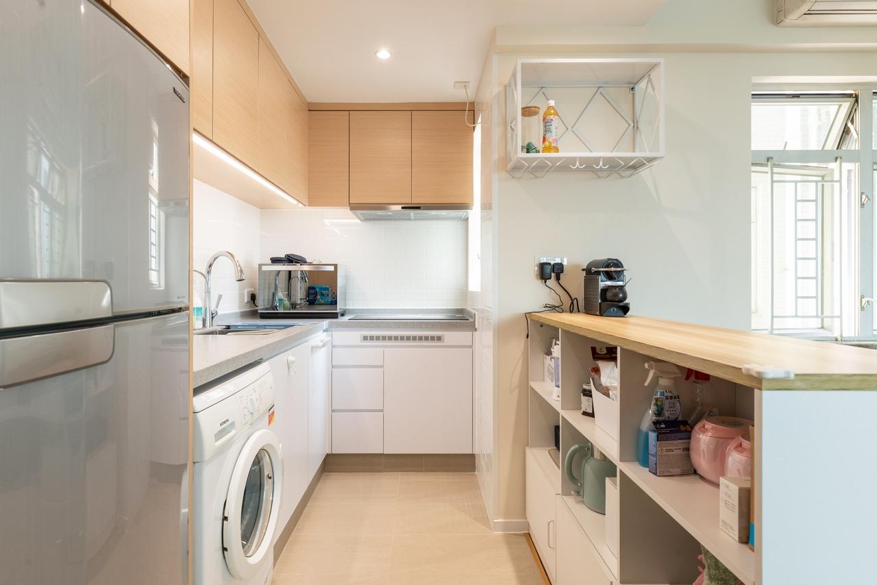 開放式廚房的設計令客廳的空間感大大增加