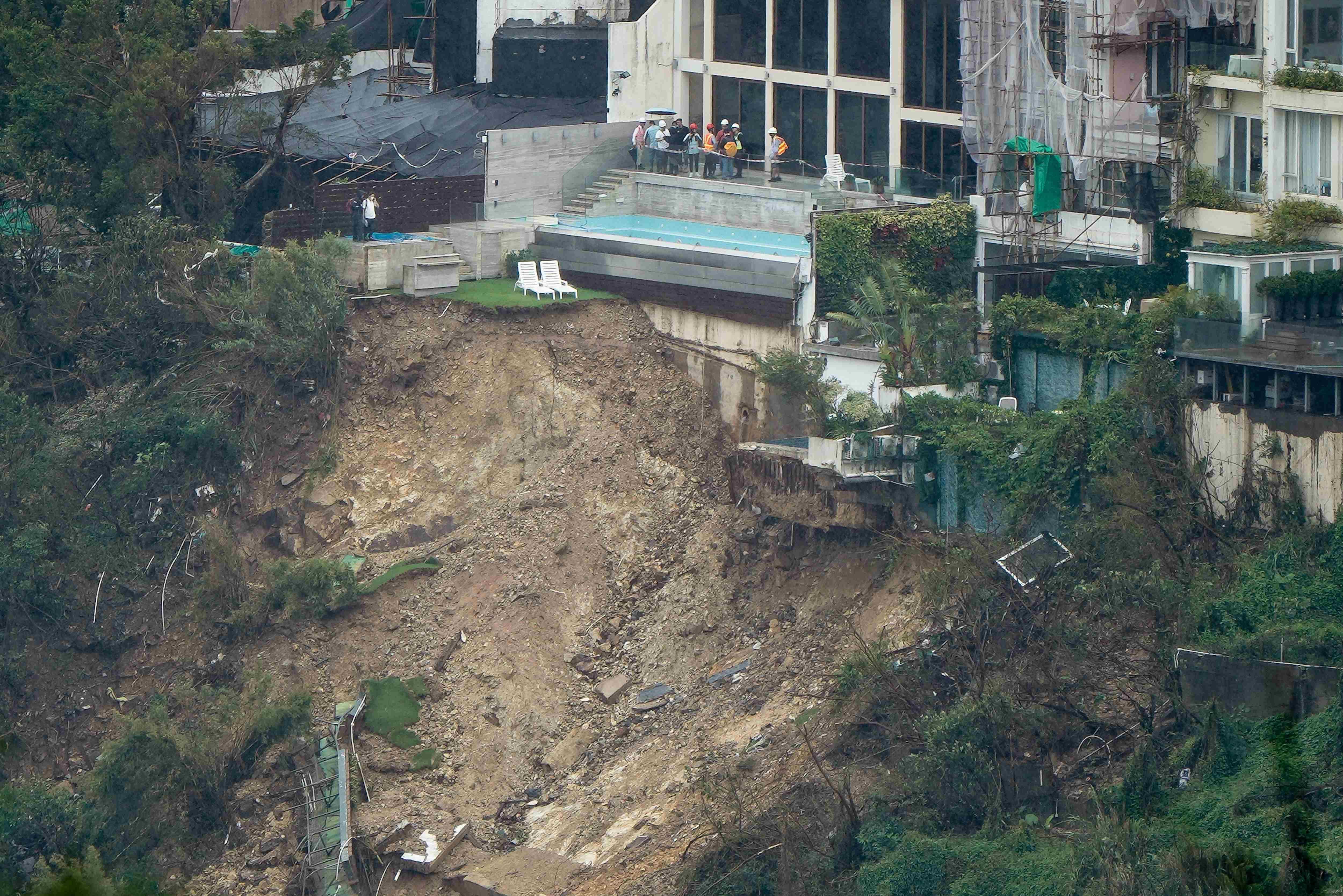 甯漢豪:研究容許業主登記輕微僭建個案 暫不處理並非特赦