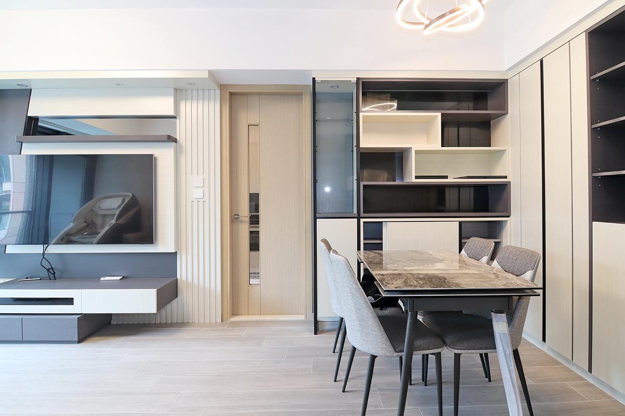 飯廳的儲物櫃以黑白色作主打,充滿現代感的簡約流線別出心栽