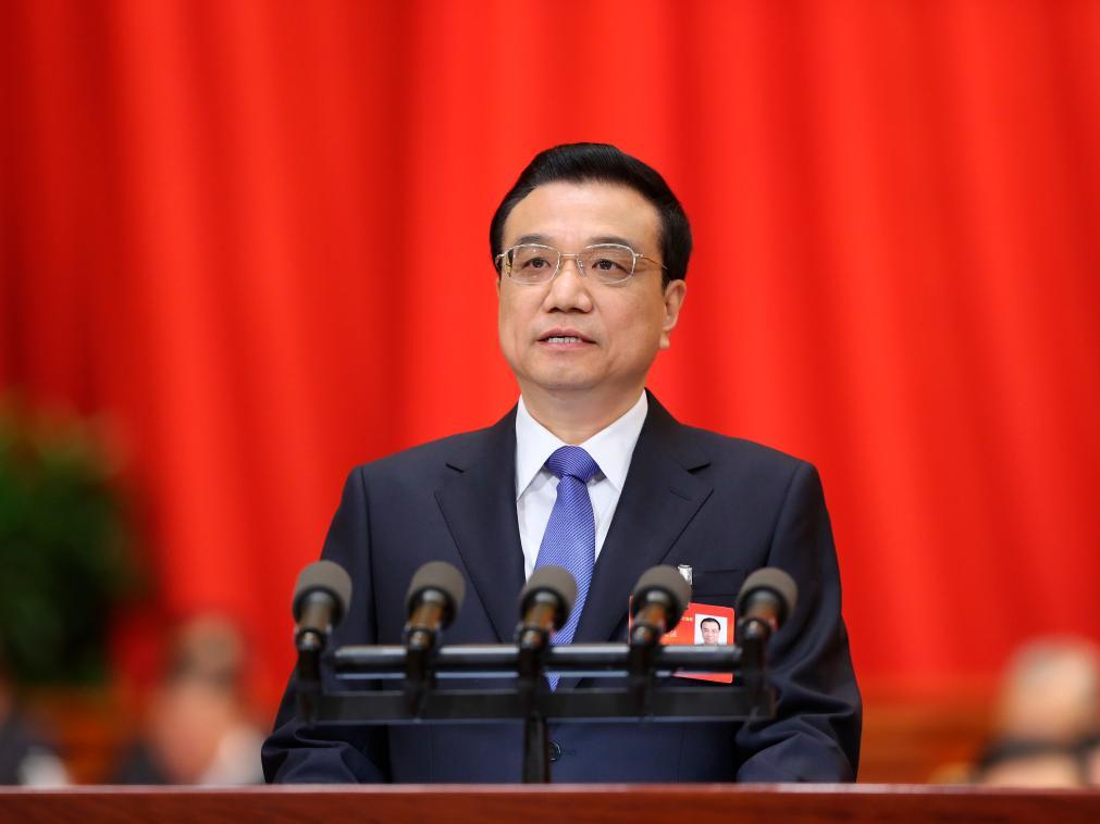 2014年3月5日,第十二屆全國人民代表大會第二次會議在北京人民大會堂開幕。李克強作政府工作報告。(新華社)