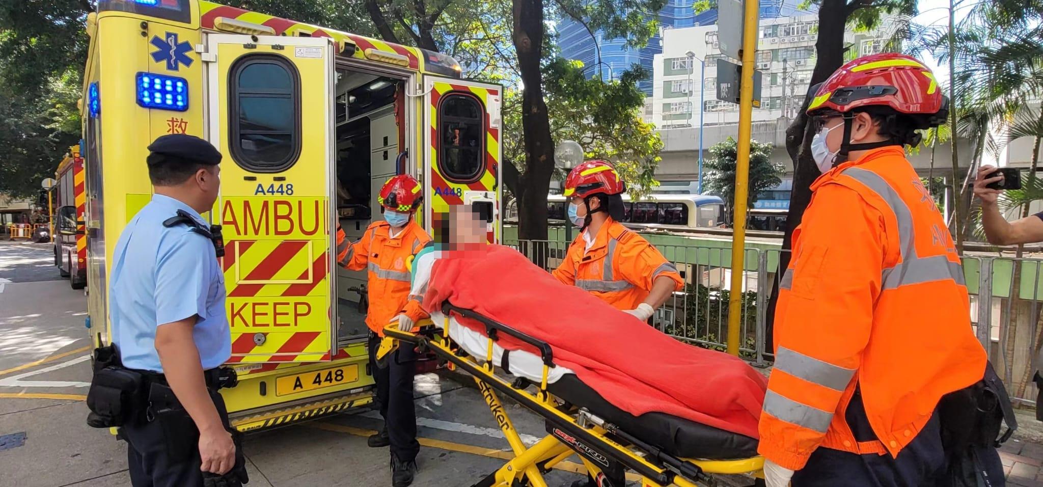 牛頭角老婦危坐大廈窗台 消防「飛將軍」及時救回屋內