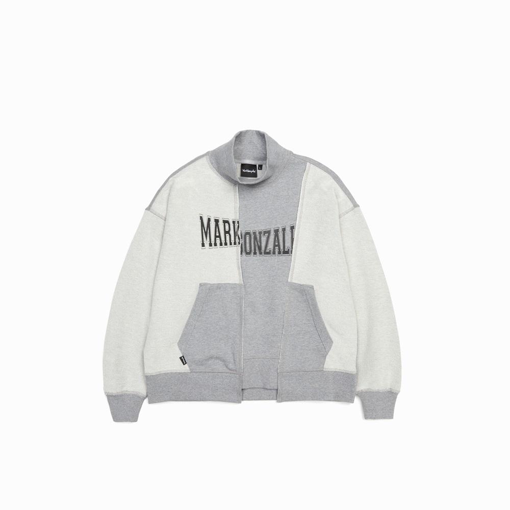Sweatshirt - Women - HK$850|以時下人氣的古著再造為創作靈感,小立領的女裝衛衣利用三本縫針的懷舊細節,以拼貼形式突顯設計的層次質感;配搭左右不對稱的裁剪,貫徹MARK GONZALES不落俗套的設計風格。