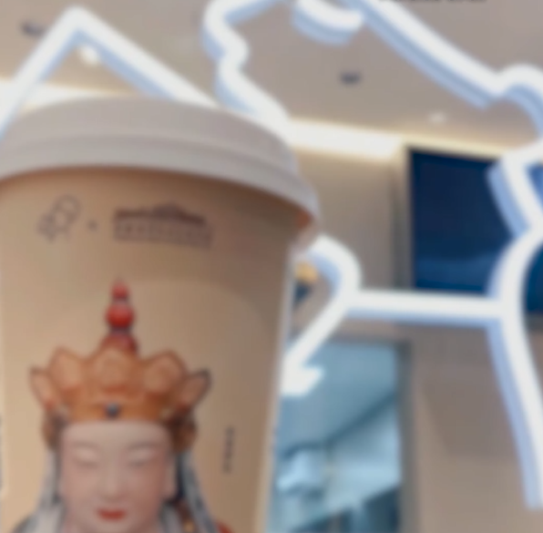 「我佛持杯」喜茶「佛喜」茶拿鐵之前的宣傳及網上照片。(互聯網)