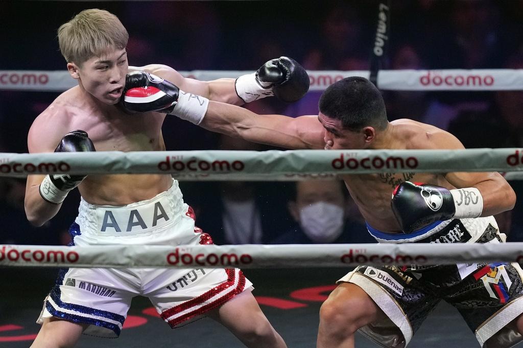 日本拳王井上尚彌包辦兩級別的拳王金腰帶。(美聯社)