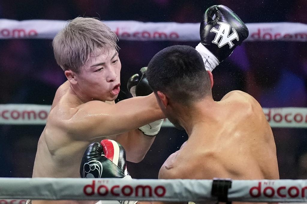 日本拳王井上尚彌包辦兩級別的拳王金腰帶。(美聯社)